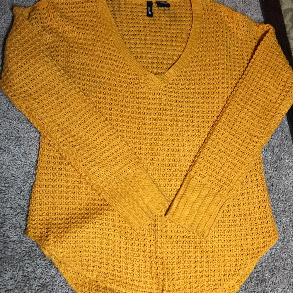 yellow sweater
